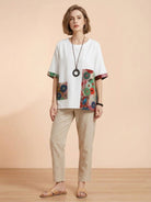 Oversized cotton linen floral shirt with round neckline and elbow sleeves