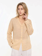 Lightweight 100% linen relaxed fit V-neck shirt with long wide cuffs and curved hem