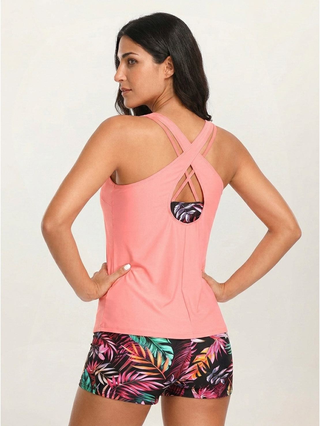 Three-piece tankini set with criss-cross back tank top, printed sports bra, and boy shorts