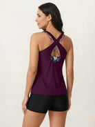 Three-piece tankini set with solid scoop neck tank and criss-cross back sports bra and boy shorts