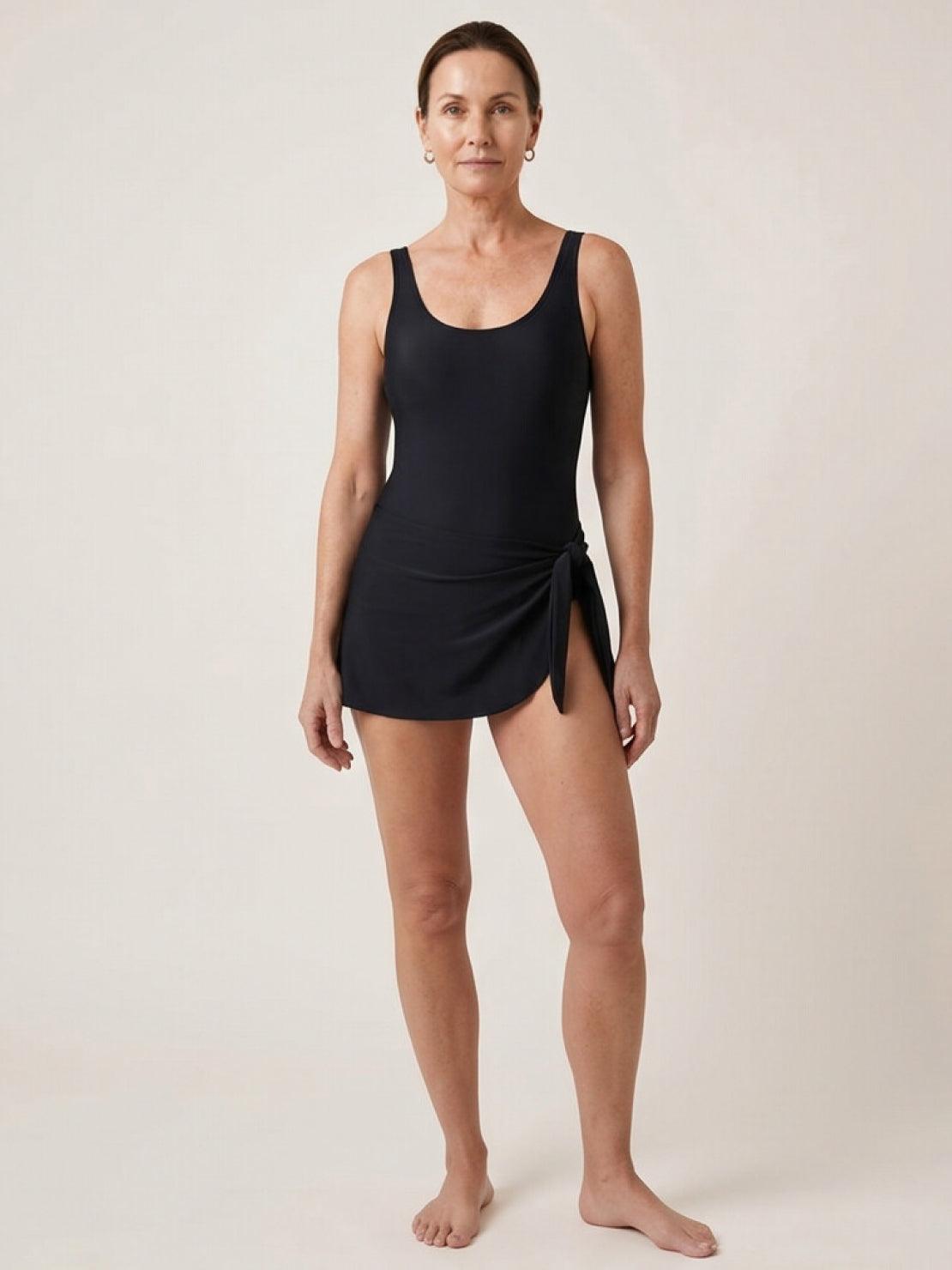 Ruched wrap one-piece swimdress with adjustable straps and built-in shorts for active comfort and coverage