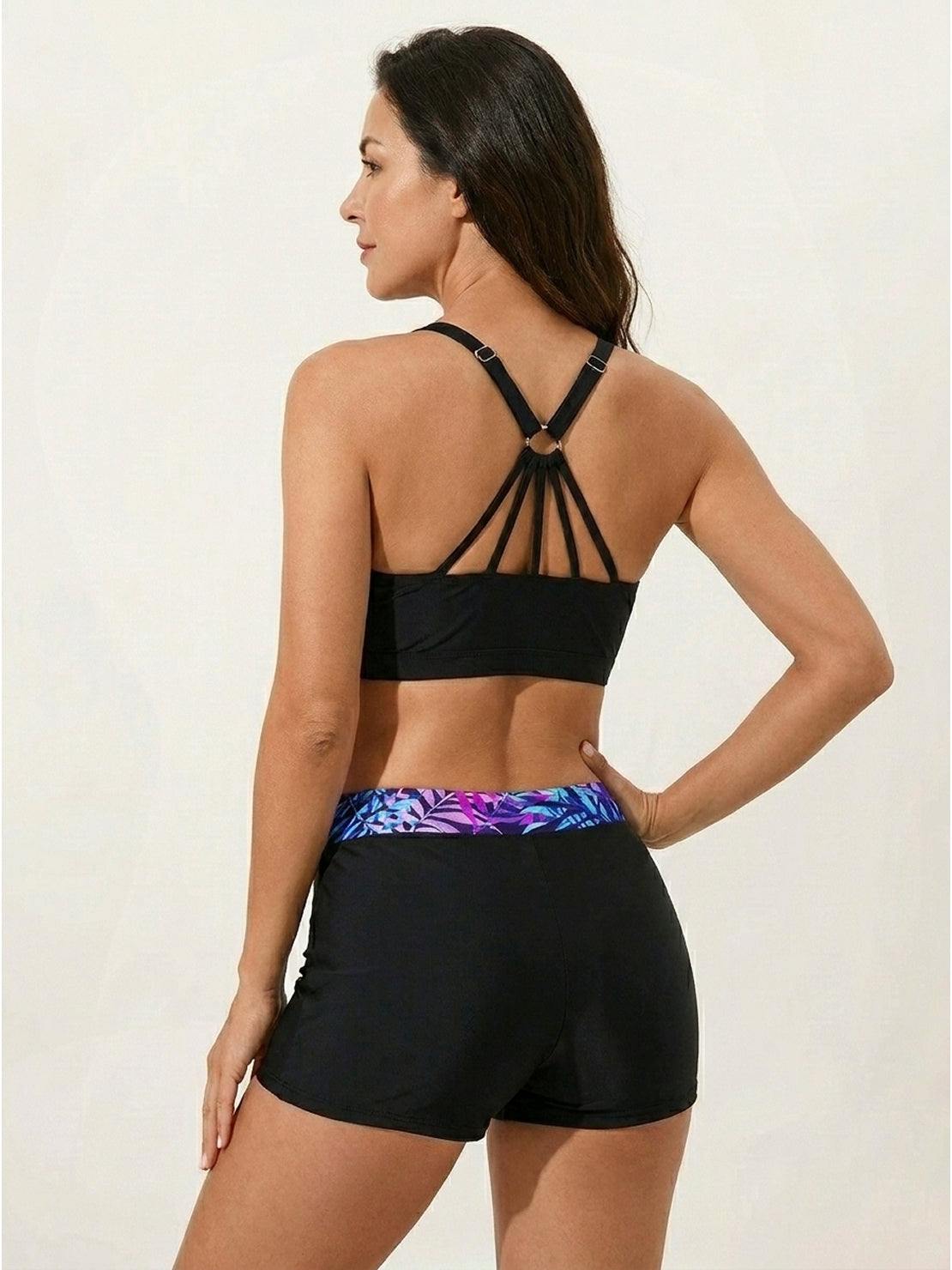 Three-piece open-back swim set with loose scoop-neck tank, racerback crop bra, and mid-rise boy shorts