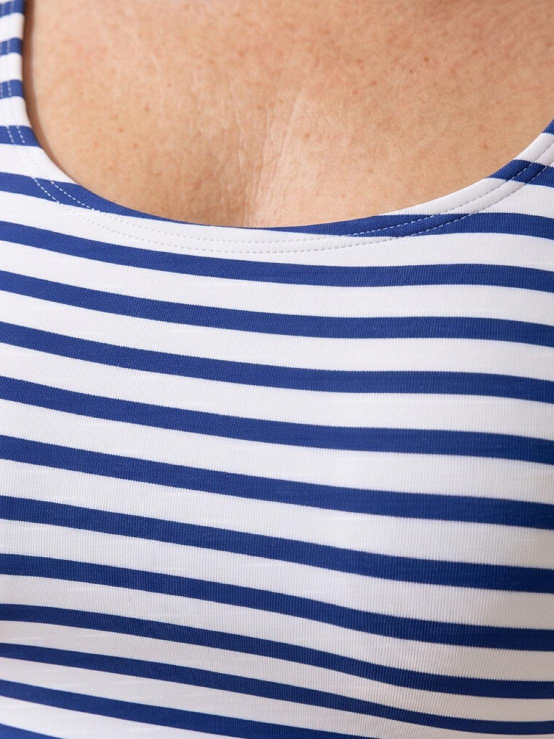 Black adjustable ruched tankini top with wide straps and matching classic black bikini bottoms