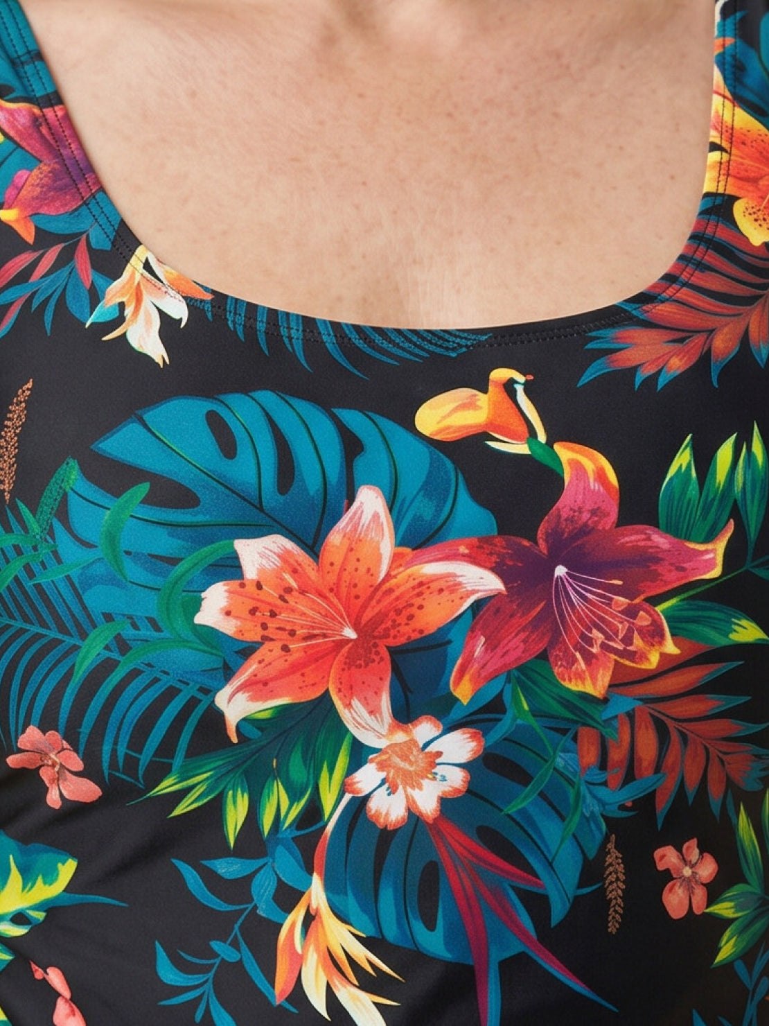 Black adjustable ruched tankini top with full-length side ruching and matching classic black bikini bottoms