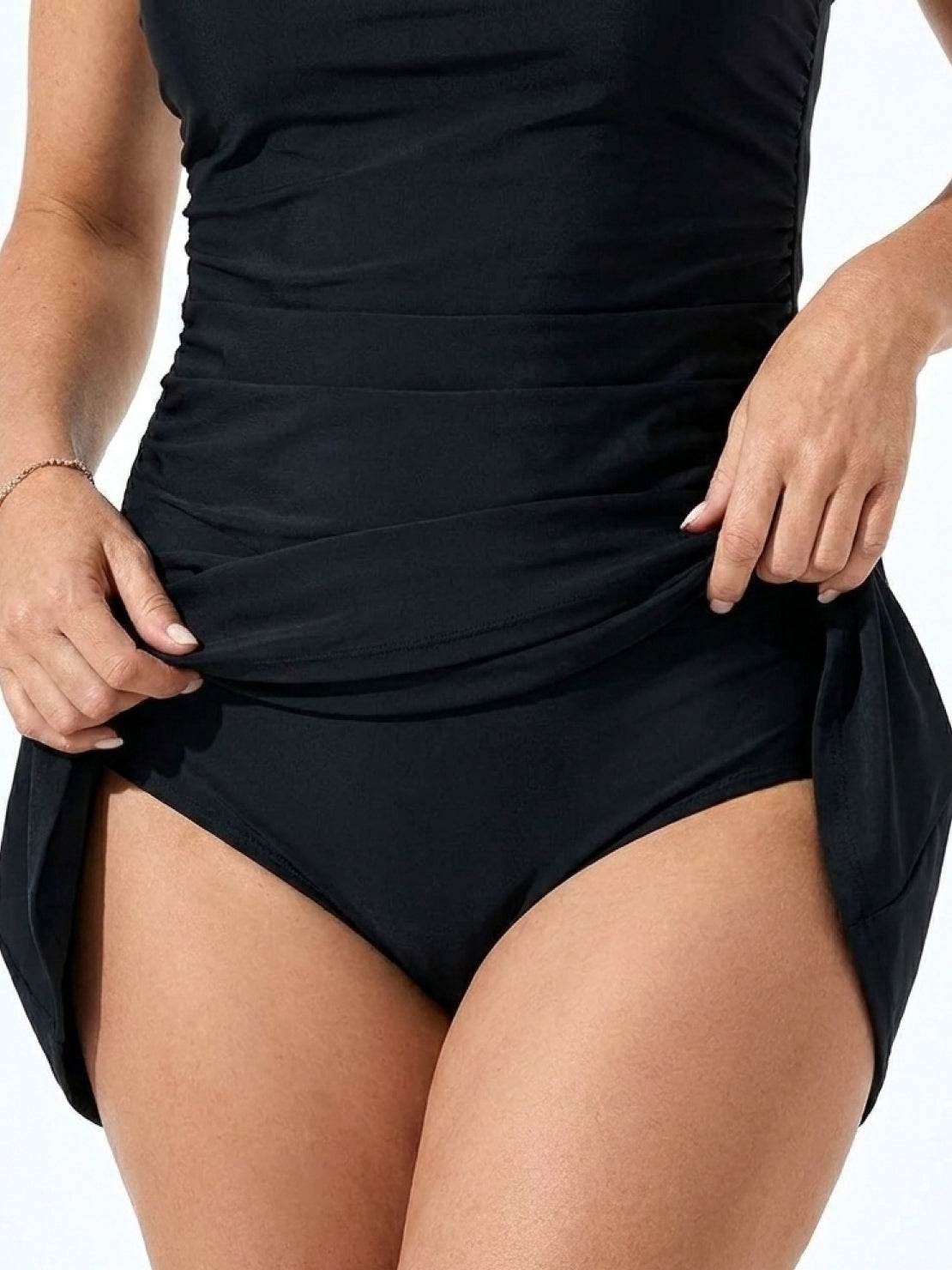 High-neck ruched tankini set with gathered sides and built-in shelf bra for swim and beachwear