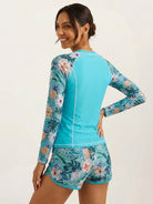 long-sleeve UV rash guard set with tropical print sleeves and matching swim shorts