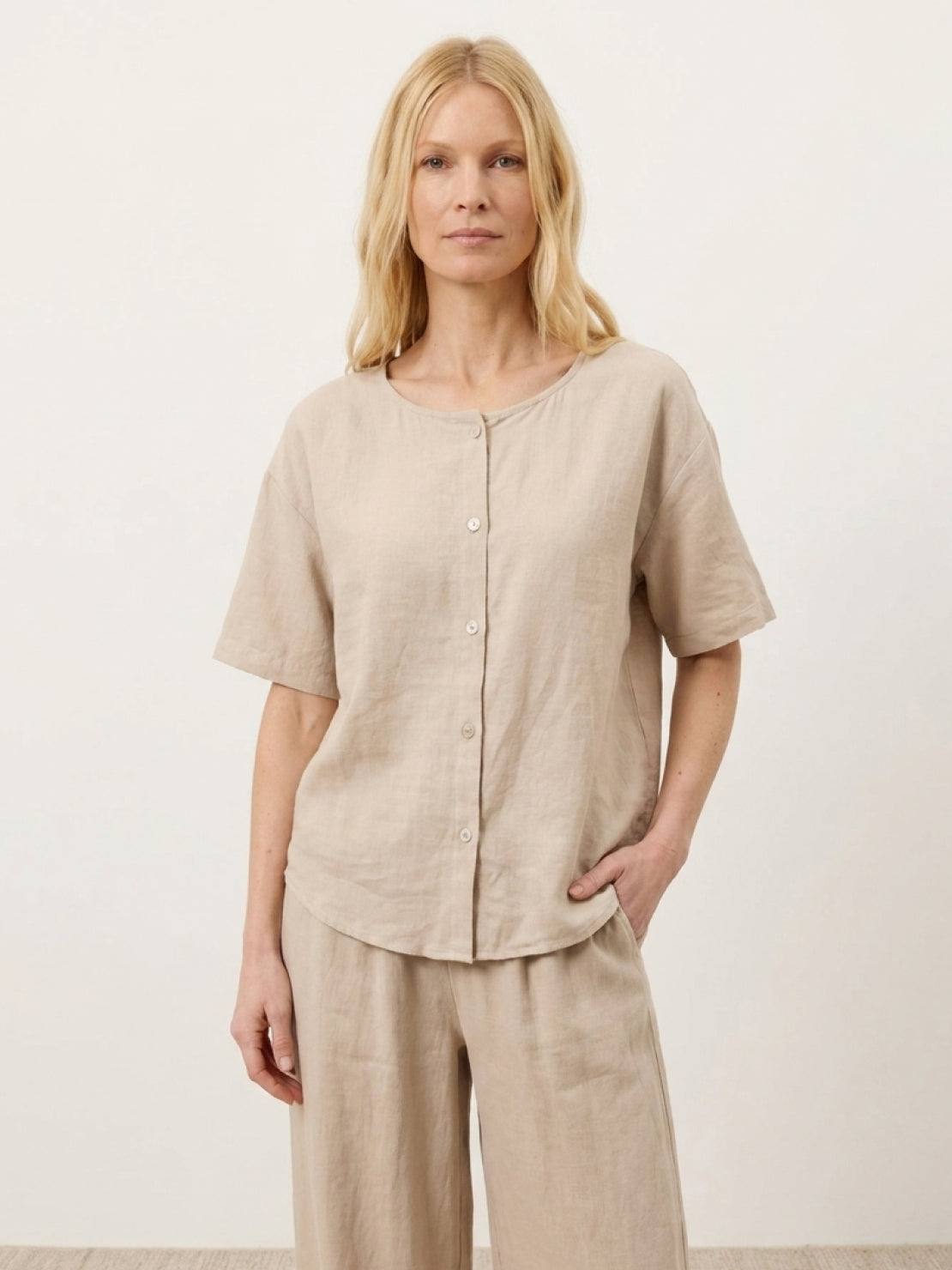 Comfortable 100% cotton two-piece set with button-front top and wide-leg pants in soft solid colors