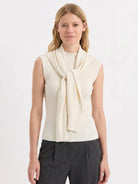 knit vest with attached scarf in soft fine ribbed knit, sleeveless design with mock neckline