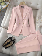 Double-breasted blazer and wide-leg trousers co-ord with gold lion-head buttons and notched lapel in structured suiting fabric