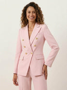 Double-breasted blazer and wide-leg trousers co-ord set with gold lion-head buttons and notched lapel