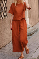 Breezy Meadow Two-Piece Set featuring soft-tailored top and wide-leg trousers in lightweight polyester fabric