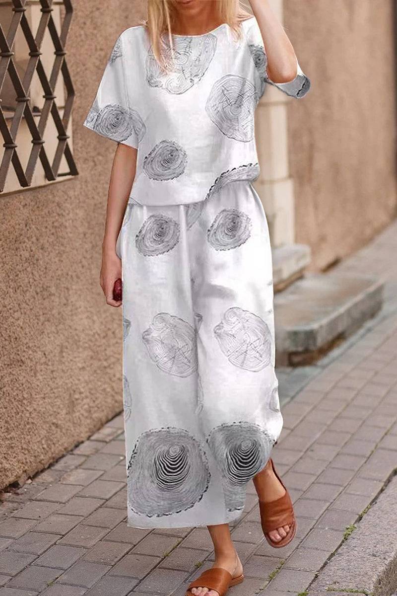 Woman wearing Breezy Meadow Two-Piece Set with relaxed fit and wide-leg trousers in lightweight polyester fabric