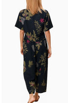 woman wearing breezy meadow two-piece set with relaxed fit and wide-leg trousers