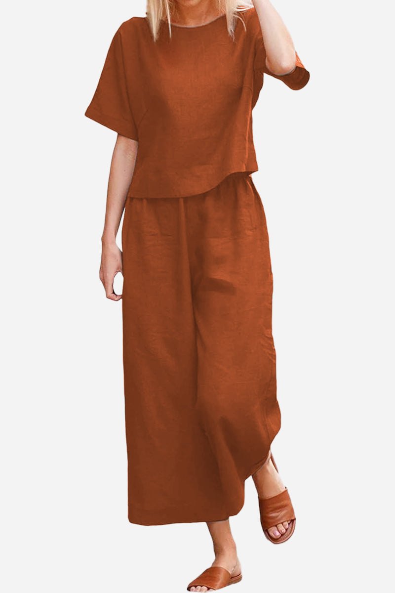 woman wearing Breezy Meadow Two-Piece Set with wide-leg trousers and relaxed top in soft polyester fabric