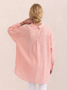 Peach oversized linen shirt with back pleat detail and relaxed fit