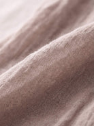Lightweight cotton-linen summer midi dress with tiered skirt and relaxed drop-waist silhouette