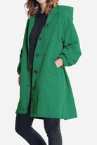 Green water resistant oversized hooded windbreaker rain jacket for women