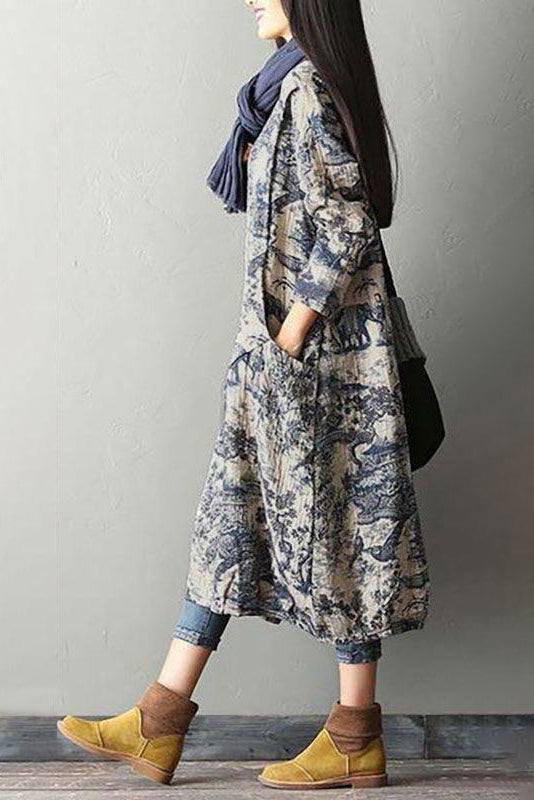 woman wearing Japanese porcelain print midi dress with 3/4 sleeves and oversized pockets walking indoors