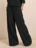 Black short-sleeved pullover with wide trouser matching set in breathable cotton fabric
