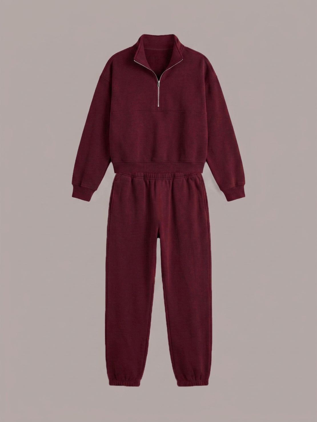 Cotton-blended two-piece tracksuit with zip-front top and straight-leg pants worn by a model