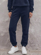 cotton-blended two-piece tracksuit with zip-front top and straight-leg pants on white background
