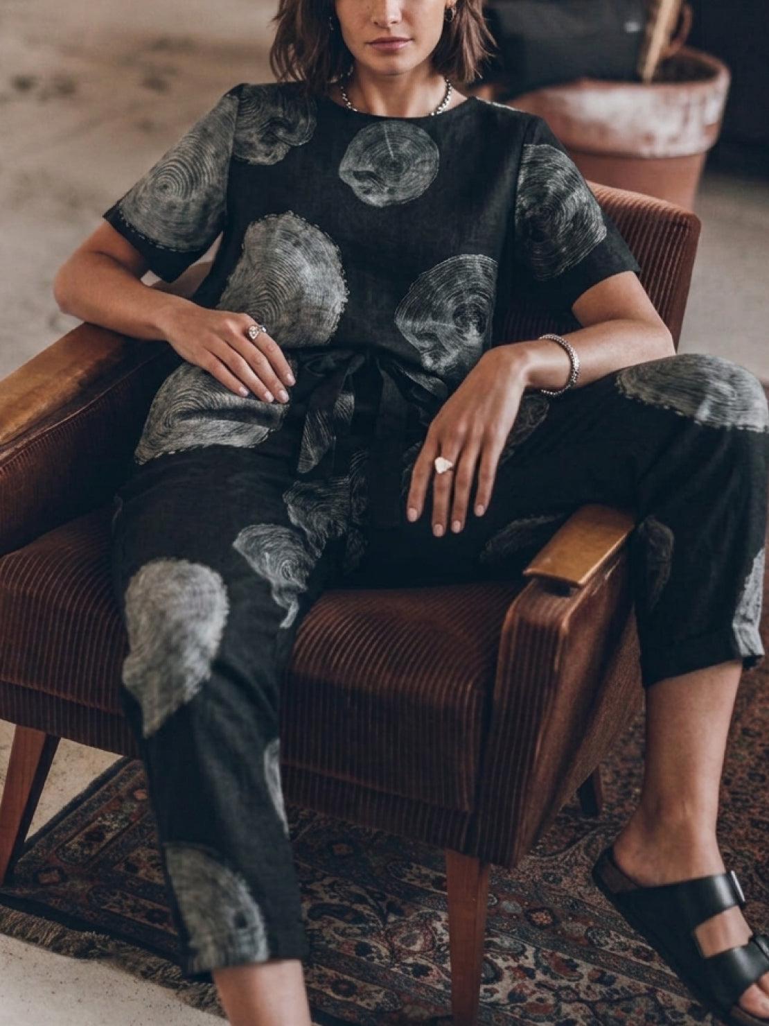 Relaxed cotton linen set with short-sleeve top and straight-leg pants in monochrome tones