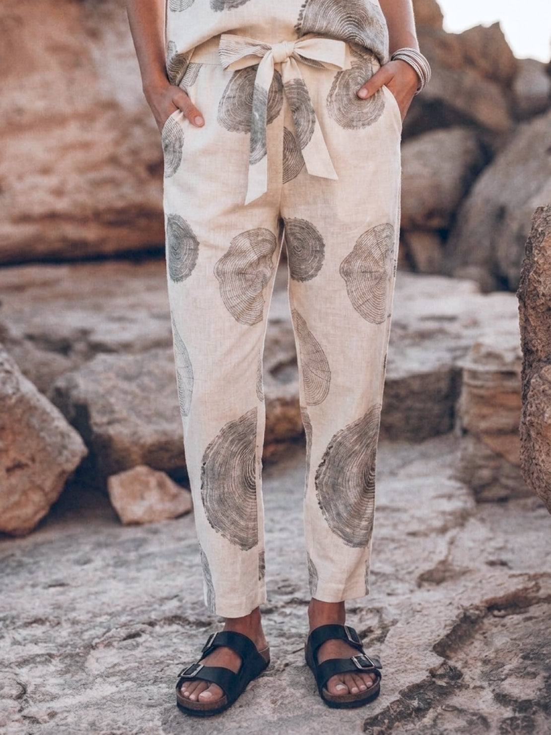 woman wearing relaxed cotton linen monochrome two-piece set with short sleeve top and straight-leg pants