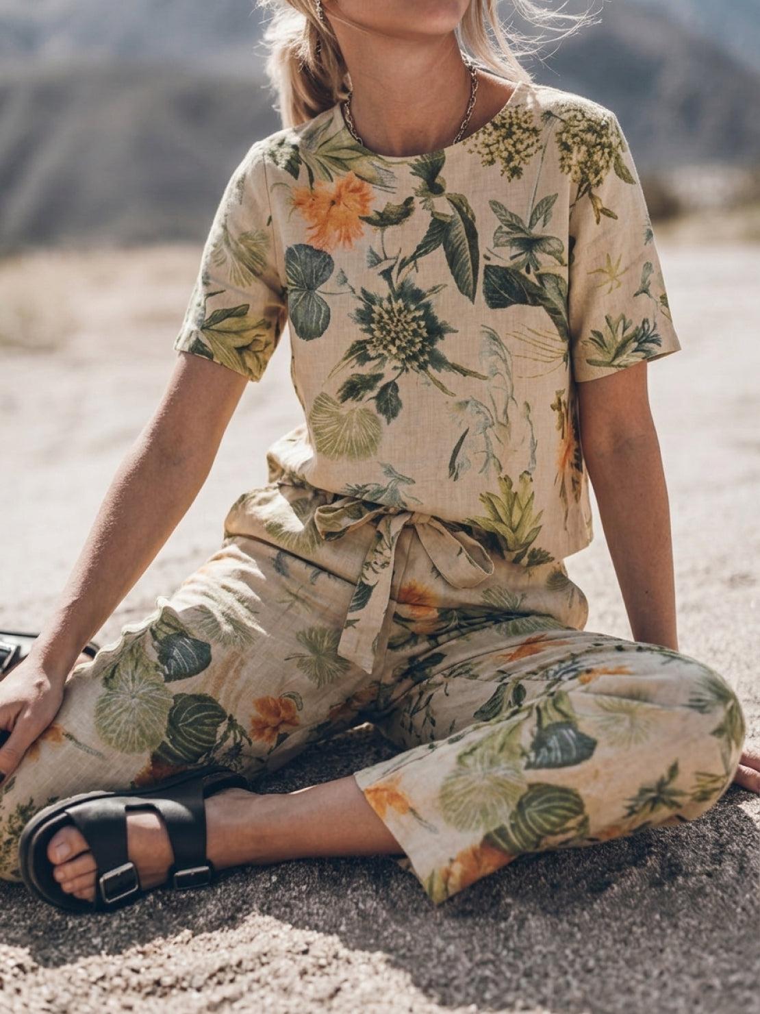 Woman wearing 100% cotton linen set with relaxed short-sleeve top and straight-leg pants in monochrome tone