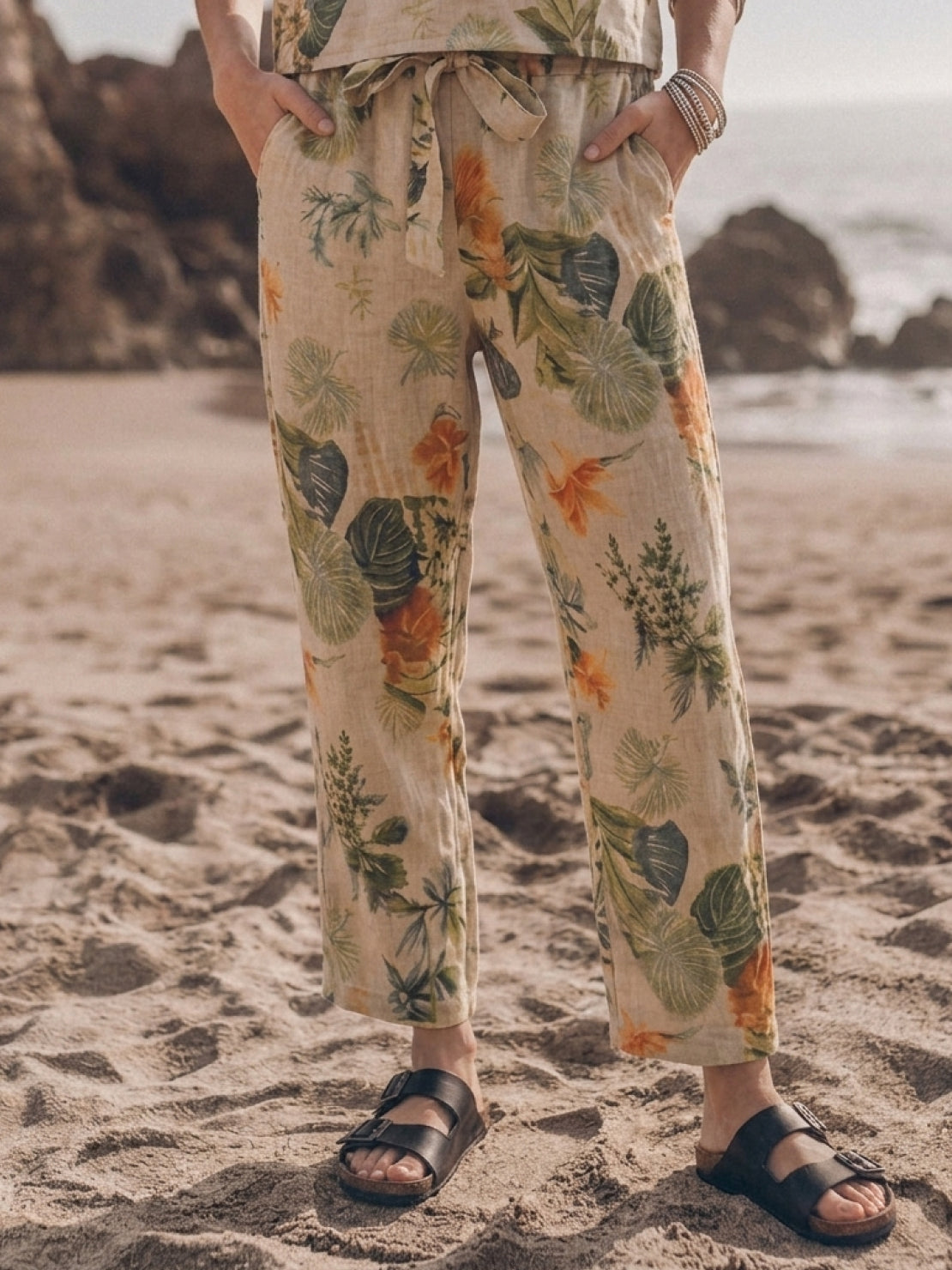 woman wearing relaxed cotton linen set standing outdoors in monochrome tones