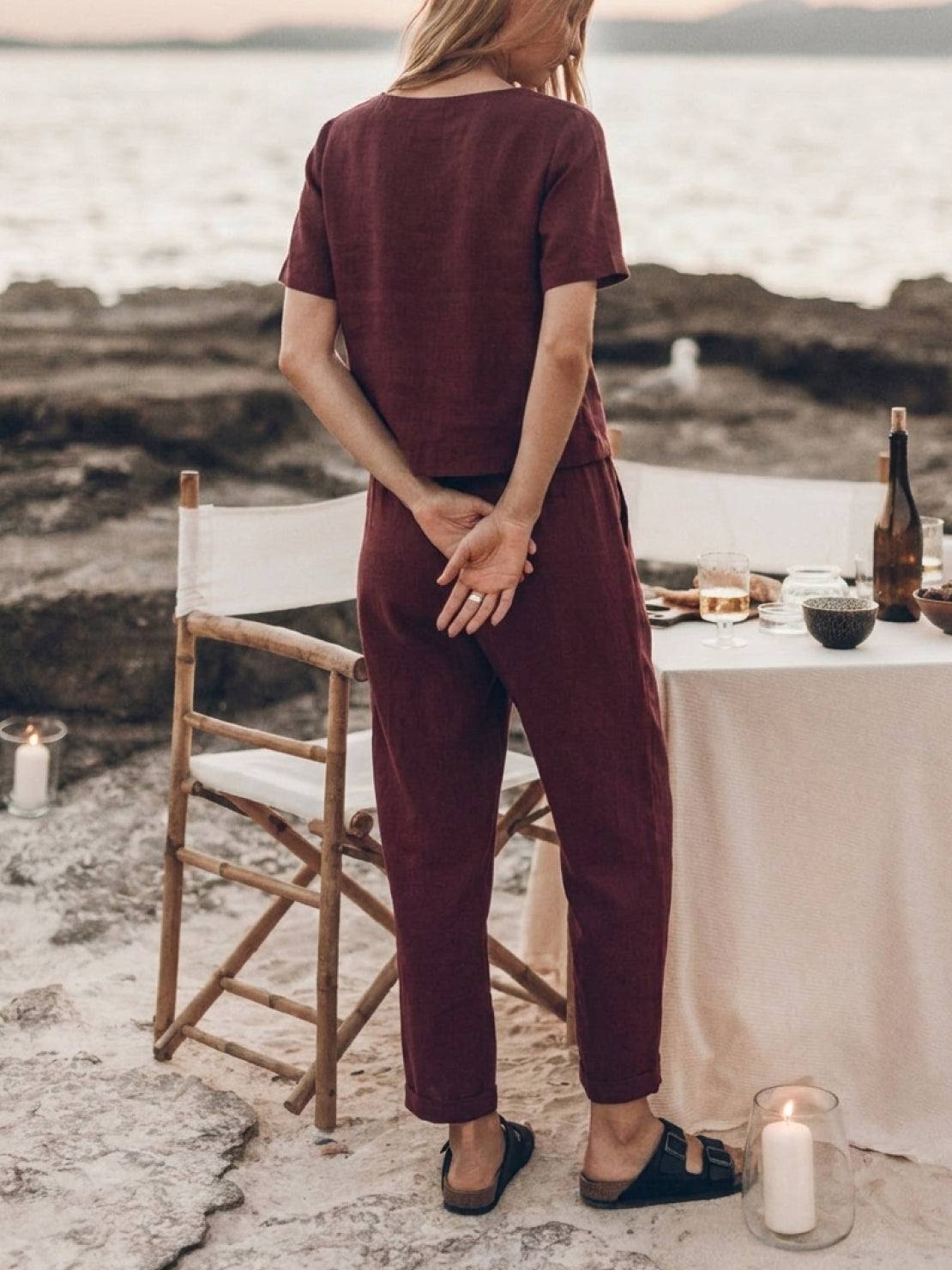 woman wearing relaxed cotton linen set with monochrome top and straight-leg pants