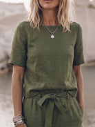 woman wearing relaxed cotton linen set with monochrome top and pants