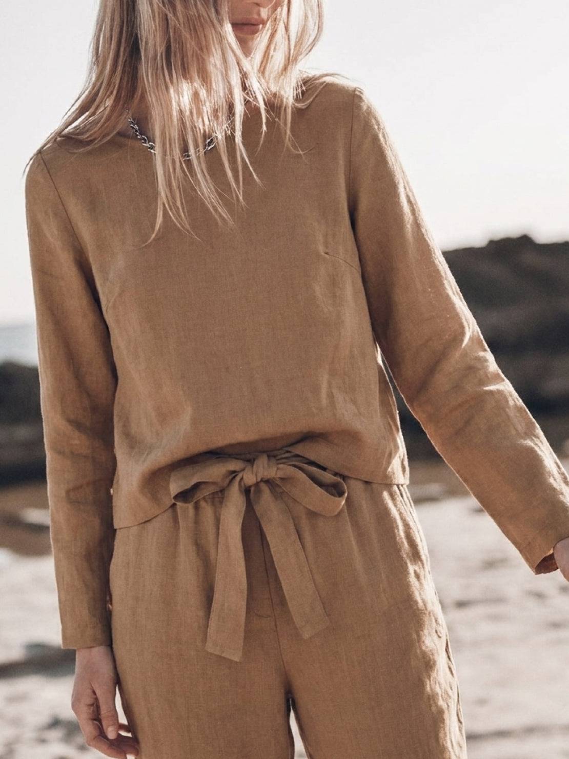 woman wearing cotton-linen monochrome relaxed longline top and wide-leg pants set