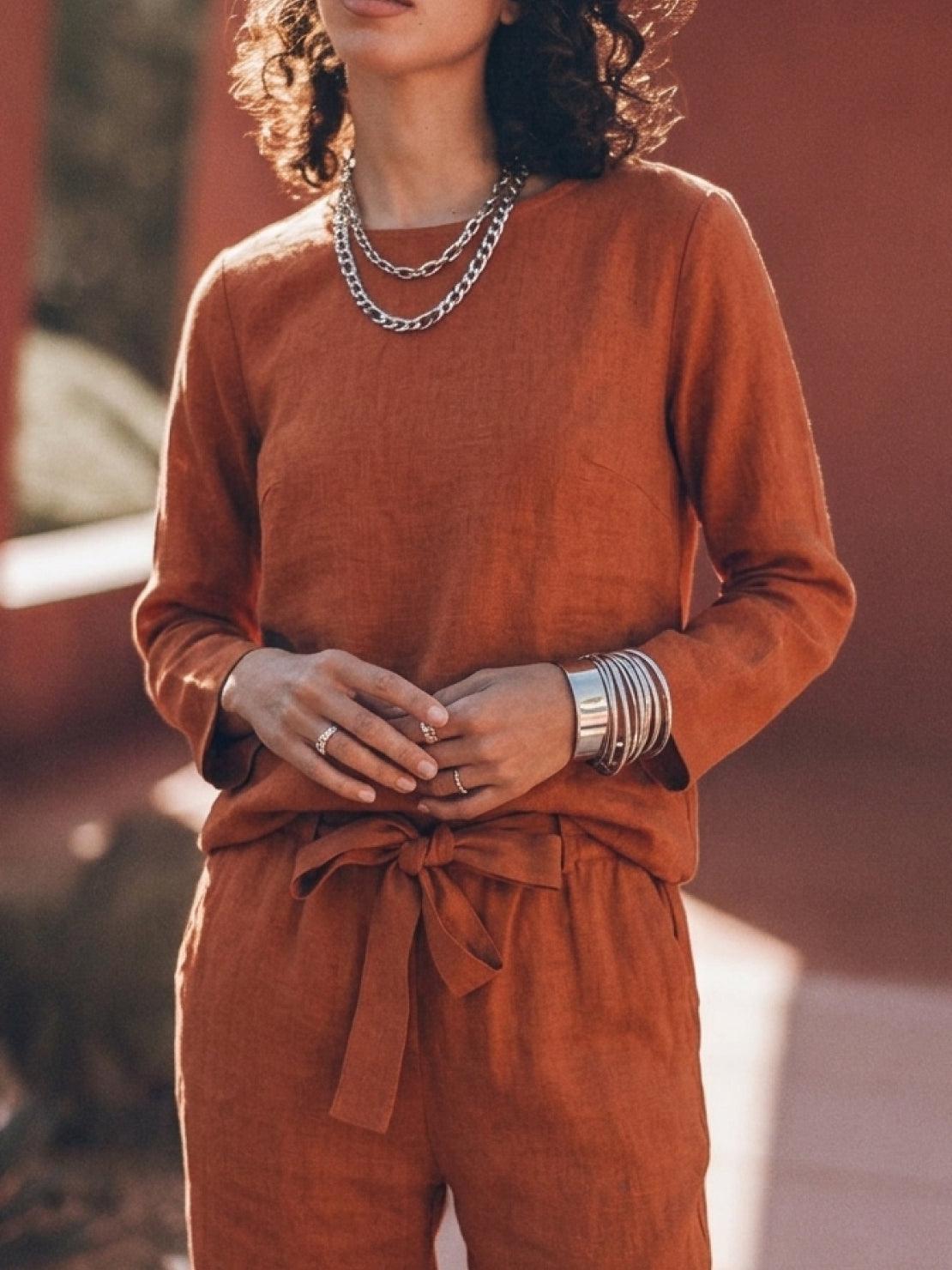 Woman wearing relaxed cotton-linen monochrome longline top and wide-leg pants set