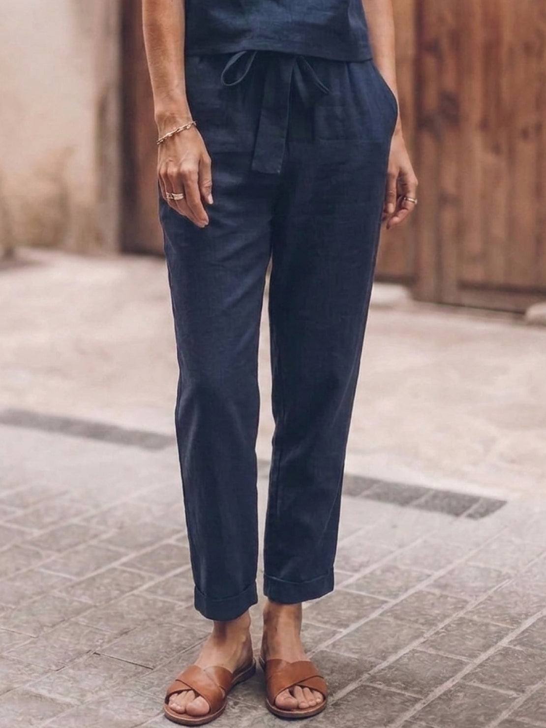 Model wearing relaxed cotton-linen monochrome longline top and wide-leg pants set