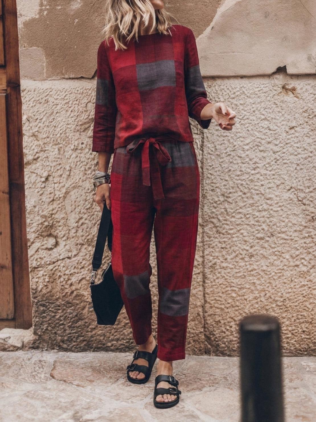 Model wearing relaxed cotton-linen monochrome longline top and wide-leg pants set in neutral tones