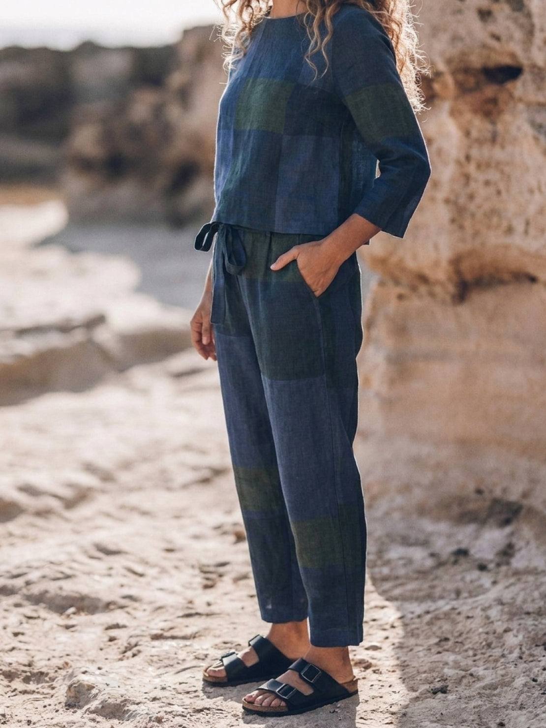 woman wearing relaxed cotton-linen monochrome longline top and wide-leg pants set