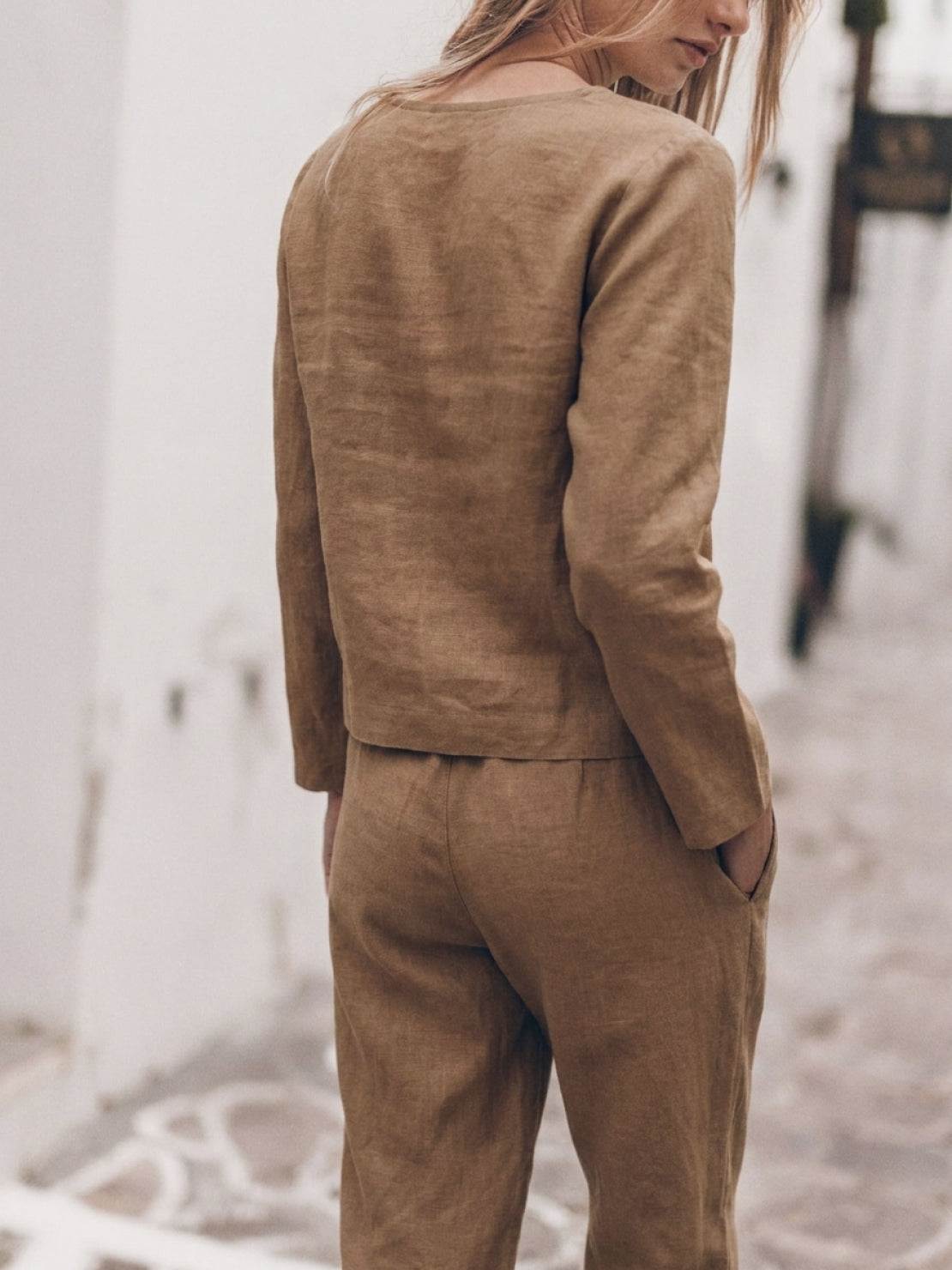 Woman wearing cotton-linen monochrome relaxed longline top and wide-leg pants set