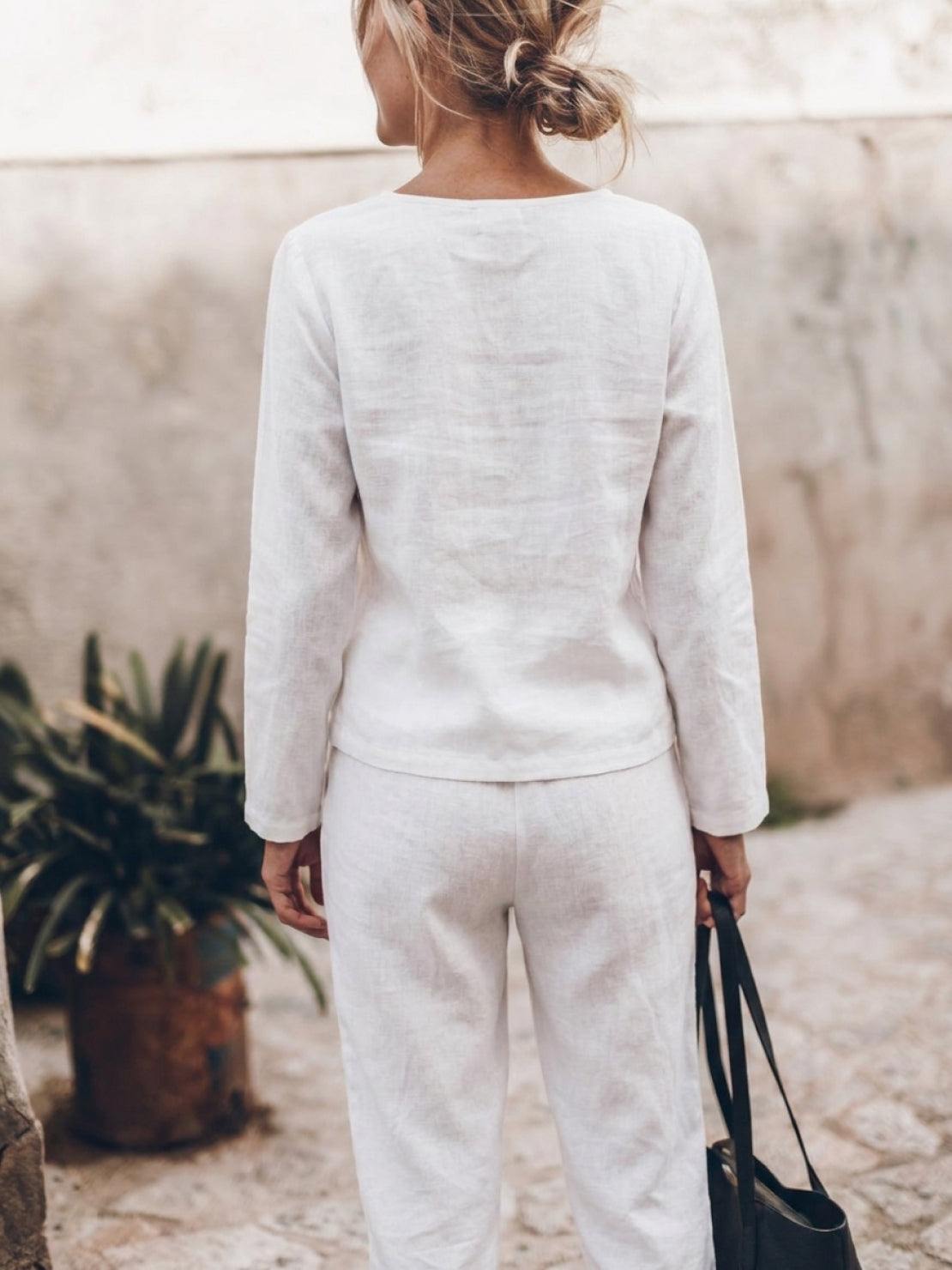 Woman wearing cotton-linen monochrome relaxed longline top and wide-leg pants set