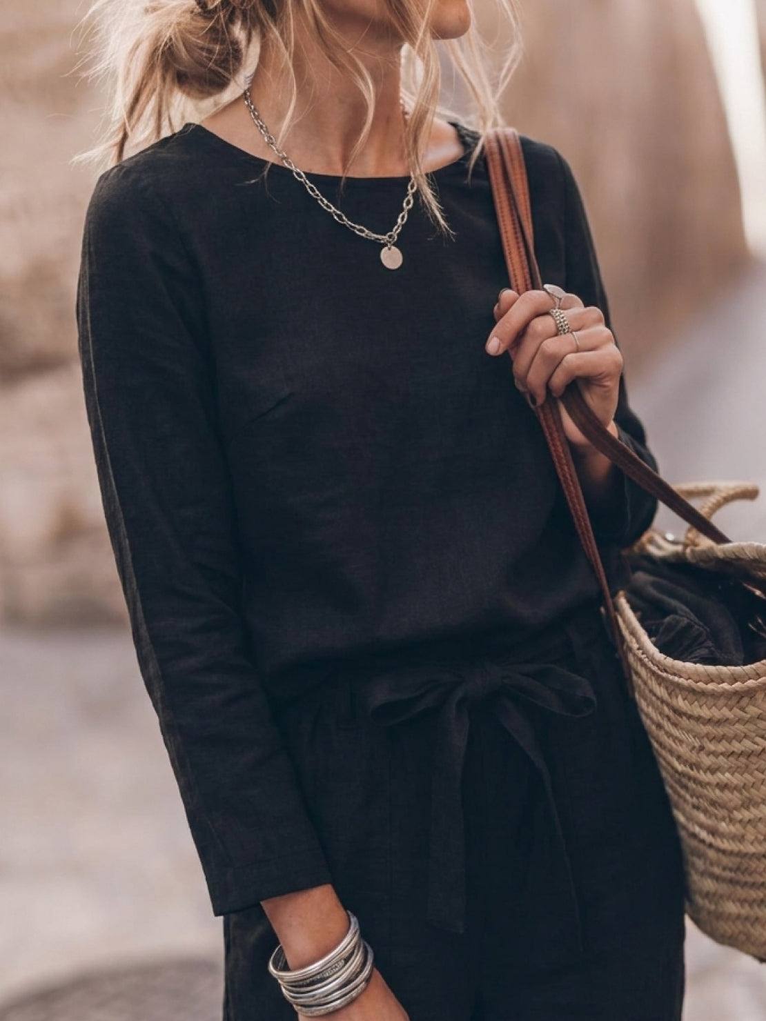 woman wearing cotton-linen monochrome relaxed longline top and wide-leg pants set