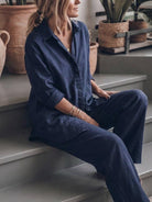 Model wearing oversized 100% cotton shirt and wide-leg pants co-ord set in a relaxed, breathable design