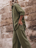 Model wearing an oversized 100% cotton shirt and wide-leg pants co-ord set in a relaxed, breathable fit