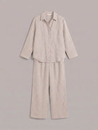 Woman modeling oversized 100% cotton shirt and wide-leg pants co-ord set in relaxed style