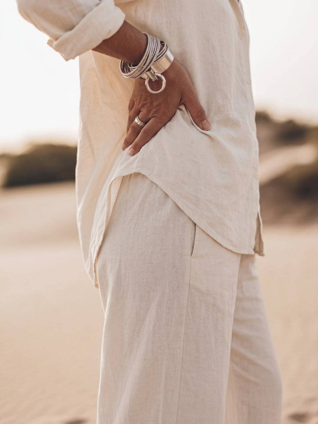 Model wearing oversized 100% cotton shirt with wide-leg pants co-ord set in relaxed fit