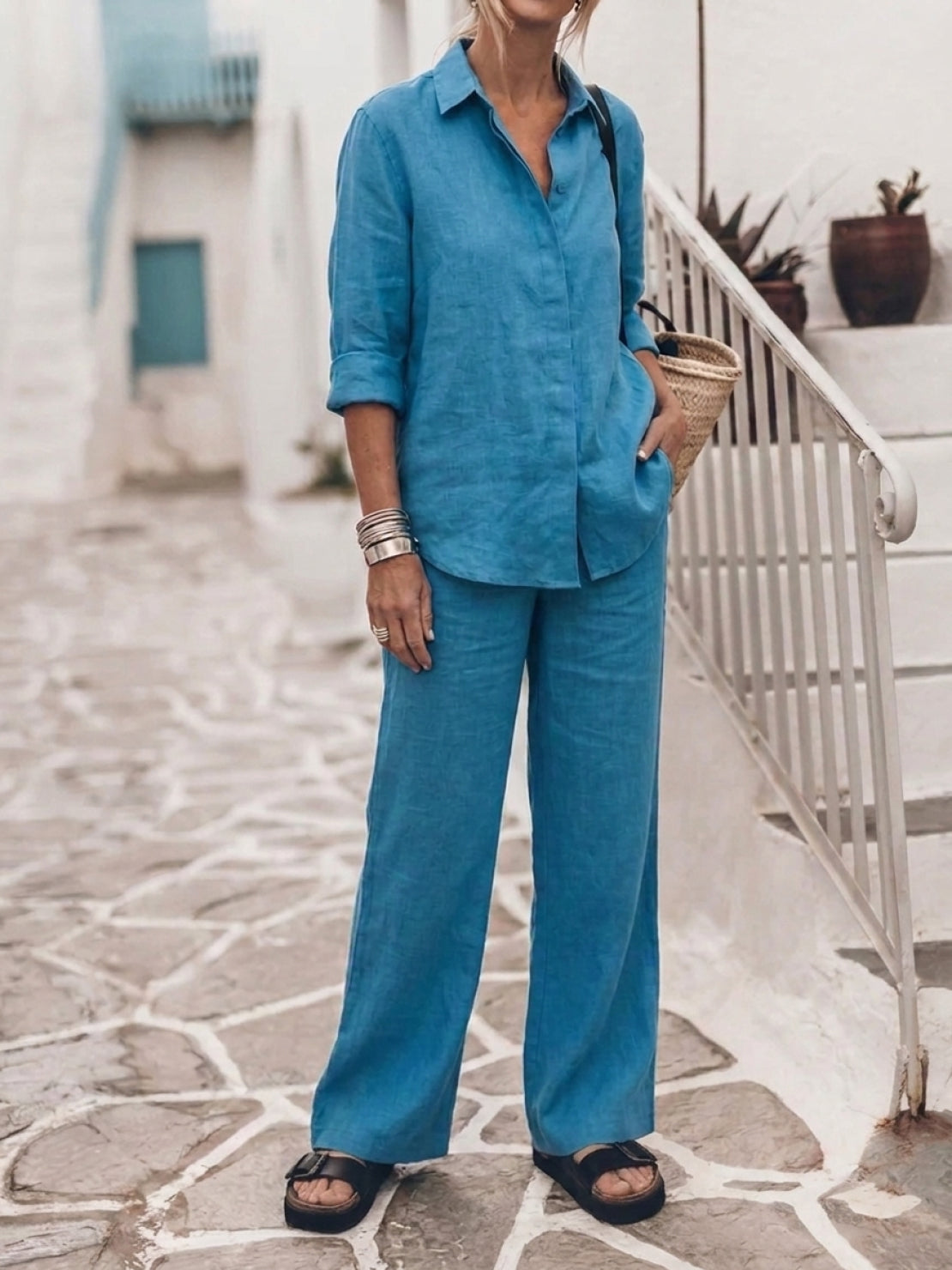 Model wearing oversized 100% cotton shirt with wide-leg pants co-ord set in relaxed fit
