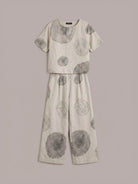 Loose fit co-ord set with soft-tailored top and wide-leg cotton bottoms in light beige
