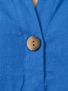 pure linen age-defying shirt with button detail on white background