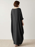 Bohemian maxi dress in loose fit linen blend with long sleeves and floor-length hem