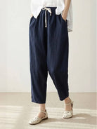 woman wearing breezy relaxed fit straight pants in casual setting