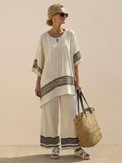 Coastal Comfort Linen two-piece set with crochet details and breathable fabric on white background