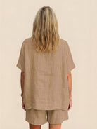 Comfy linen-like shirt and shorts two-piece set in breathable fabric for casual and versatile style